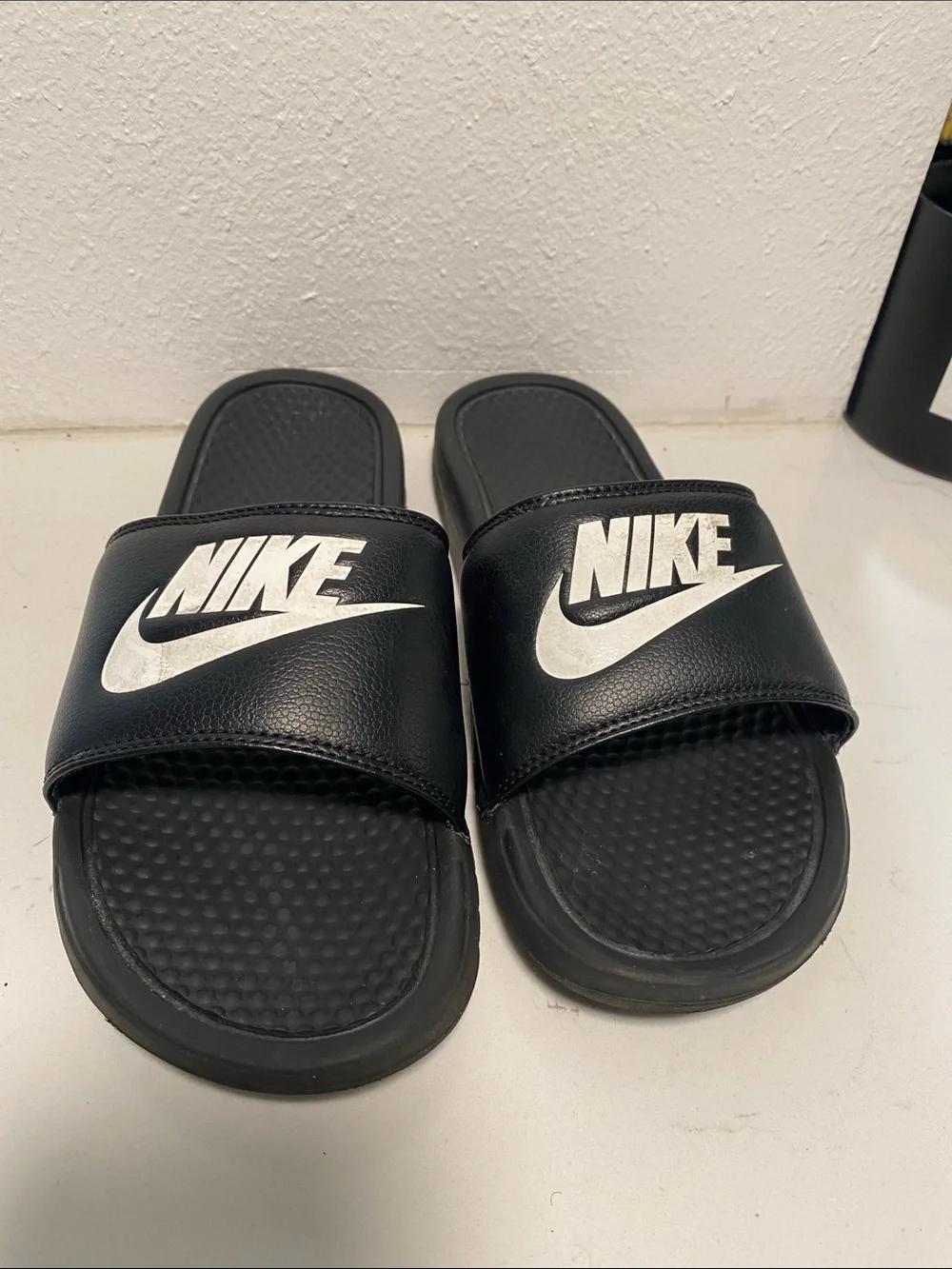 Nike Black Slide Sandals with White Swoosh Logo - Kids